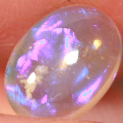 SOLID CRYSTAL OPAL Transparent with rich purple within